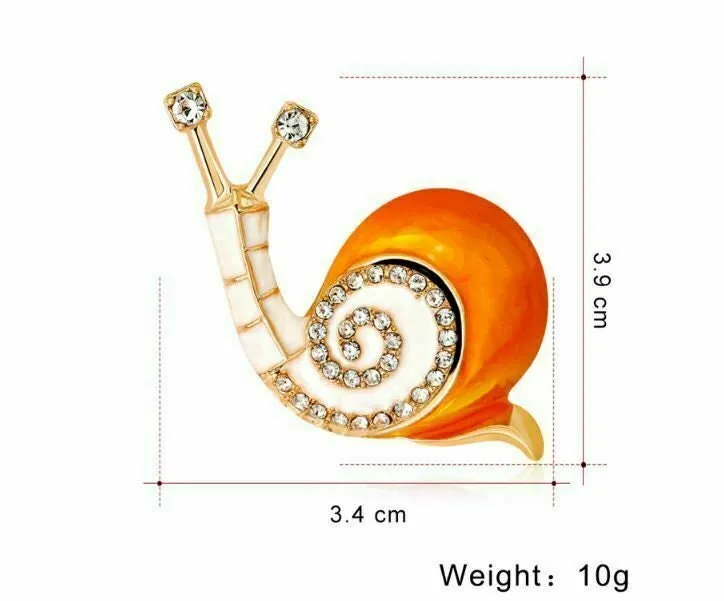 Stunning diamante gold plated orange snail brooch suit coat broach pin collar u